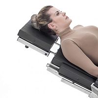 Headrest for operating tables