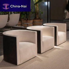 Contemporary armchair Confident fabricleatherwooden