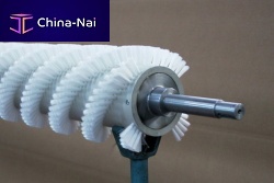 Cylindrical spiral brush cleaningfor polishing pads maintenancemetal