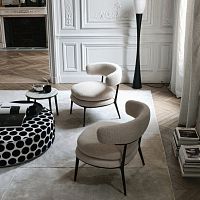 Contemporary armchair Caratosfabricleathercast aluminum
