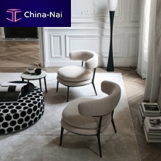 Contemporary armchair Caratosfabricleathercast aluminum