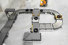 Tire transport system beltdriven rollerfor the automotive industry