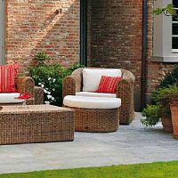Contemporary armchair BALISunbrella®synthetic fiberwith footrest