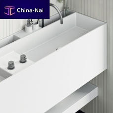 Wall-mounted washbasin PlanCorian®with countercustom