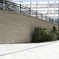 Concrete retaining wall TENSARTECH® TW1on reinforced soilmodularpre-cast
