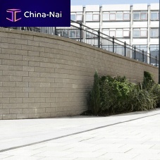 Concrete retaining wall TENSARTECH® TW1on reinforced soilmodularpre-cast