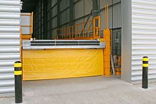 Hydraulic dock leveler vertical