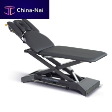 Electric massage table Kinos Xwith adjustable height backrestwith headrestwith armrests