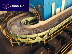 Vibrating conveyor SYNCRO-COIL®inclinedcurvedtrough