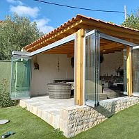 Folding patio door IN AGIOS STEFANOScrystaldouble-glazeddouble leaf