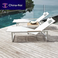Contemporary sun lounger NINIXBatyline®stainless steelsled base