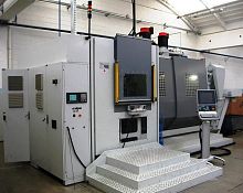3-axis CNC milling machine TSP 1verticalHSK-100-Awith integrated pallet changer