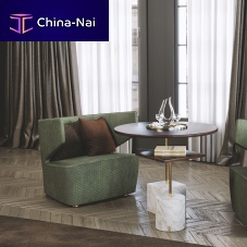 Contemporary armchair EMBRACEvelvetgreenliving room