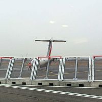 Expanded metal jet blast deflector for airport