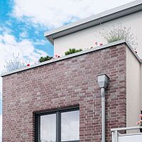 Precast concrete capping flat roofwall