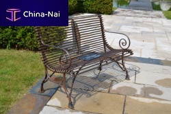 Traditional public bench woodenmetalstone