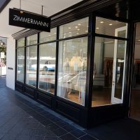 Stick system curtain wall ZIMMERMANN STOREwoodeninsulated glass paneldecorative