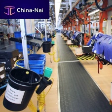 Industrial vehicle conveyor system assembly linefloor-mounted