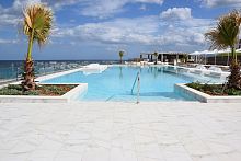 Wall swimming pool CUSTOM BUILToverflowoutdoorcommercial