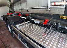 On-board weighing system for waste