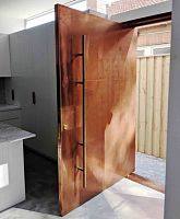 Entry door Australiacopperpivoting with offset axiscontemporary