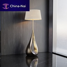 Floor-standing lamp PYROpolished brassfabricfiberglass