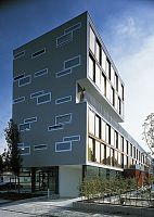 Panel cladding RESIDENTIAL AND COMMERCIAL BUILDING, WESTENDSTRAE, MUNICHwoodengrooved