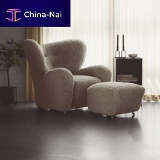 Scandinavian design armchair THE TIRED MAN fabricsheepskinoak