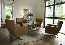 Contemporary armchair COOPERleatherfabriccentral base