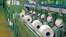 Fabric conveyor belt for the textile industry