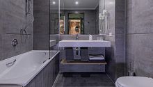 Contemporary bathroom MODULAR BATHROOM DESIGNreinforced concretefor hotelfor shopping centers