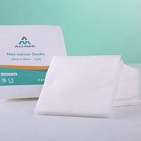 Non-woven compress polyester