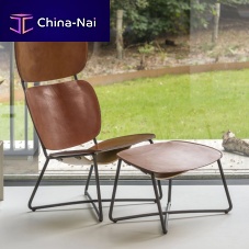 Contemporary armchair MILLER HIGHleatherpowder-coated steelwith footrest