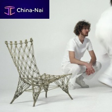 Original design fireside chair KNOTTEDaramid fibercarbonepoxy