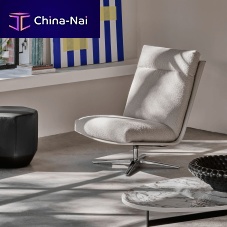 Contemporary fireside chair Kudofabricleatherwith footrest
