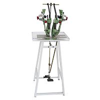 Eyeleting machine with 2 heads