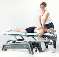 Electric massage table ManuMax Multion casterswith headrestwith armrests