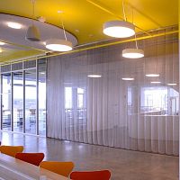 Metal fastening system CURTAINfor facade claddinginteriorexterior