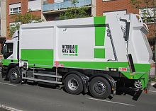 On-board weighing system for waste
