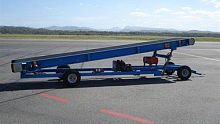 Towed belt loader for airport