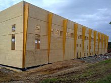 Prefab building MANHAYmodularglue-laminated woodfor industrial use