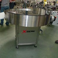 Motor-driven rotary table for conveyor