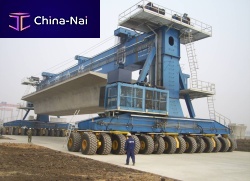 Precast beam straddle carrier rubber-tired