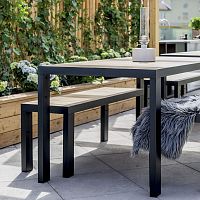 Contemporary garden bench by Broberg & Ridderstrle teakstainless steelFSC certified