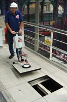 Suction slab laying machine