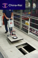 Suction slab laying machine