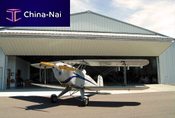 Folding hangar door automatic