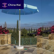 Octagonal parasol MARE mast-centeredacrylic fabricanodized aluminum