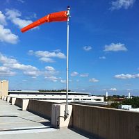 Helideck wind cone with mastinternally illuminated