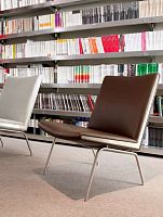 Contemporary fireside chair CH401leatherby Hans J. Wegner